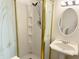 Bathroom featuring an enclosed shower and a pedestal sink at 8835 Briarclift Rd, Indianapolis, IN 46256