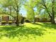 Charming brick ranch home with mature trees and a well-manicured lawn, offering great curb appeal at 8835 Briarclift Rd, Indianapolis, IN 46256
