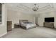 Spacious bedroom featuring a coffered ceiling, plush carpeting, and neutral decor at 8905 Stonebriar Dr, Indianapolis, IN 46259