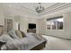 Bright bedroom with a coffered ceiling, a large window, and ample space for relaxation at 8905 Stonebriar Dr, Indianapolis, IN 46259