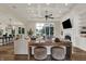 Spacious living room featuring a coffered ceiling and open access to the kitchen and dining area at 8905 Stonebriar Dr, Indianapolis, IN 46259