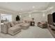 Relaxing living area with sectional sofa, modern lighting, and cozy atmosphere at 8905 Stonebriar Dr, Indianapolis, IN 46259