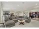 Spacious living area with tile floors, open floor plan and seamless flow into the dining area at 8905 Stonebriar Dr, Indianapolis, IN 46259