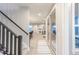 Bright hallway featuring clean lines and connecting to the dining and living spaces at 9234 Anthem Ave, Plainfield, IN 46168