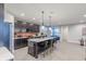 Modern kitchen with a large island, stainless steel appliances, and ample cabinet space at 9234 Anthem Ave, Plainfield, IN 46168
