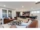 Open concept living area with seamless integration of the living room, kitchen, and dining space at 9234 Anthem Ave, Plainfield, IN 46168