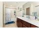 Bathroom showcasing a vanity, a tub with shower, and tile flooring at 928 Cherry Tree Ln, Greenwood, IN 46143