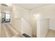 Upstairs hallway featuring carpeted floor and staircase with white trim at 928 Cherry Tree Ln, Greenwood, IN 46143