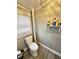 Bathroom with toilet and storage space at 929 W Roache St, Indianapolis, IN 46208