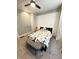 A bedroom with neutral walls and geometric bedding at 929 W Roache St, Indianapolis, IN 46208
