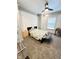 Bright bedroom features a ceiling fan and sunny window at 929 W Roache St, Indianapolis, IN 46208