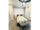 A bedroom with neutral walls and geometric bedding at 929 W Roache St, Indianapolis, IN 46208