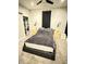 Contemporary bedroom design with a comfortable bed, bedside tables, and stylish decor at 929 W Roache St, Indianapolis, IN 46208