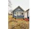 Exterior of charming home with blue siding and inviting entry at 929 W Roache St, Indianapolis, IN 46208