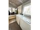 Bright laundry room with washer and dryer at 929 W Roache St, Indianapolis, IN 46208
