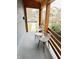 Inviting porch with seating area featuring comfortable chairs and a quaint table at 929 W Roache St, Indianapolis, IN 46208