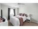 Comfortable bedroom with carpet and a white comforter at 9404 Enclave Dr # D, Avon, IN 46123