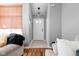 Inviting entryway featuring neutral paint, a light fixture, and views into the home at 9404 Enclave Dr # D, Avon, IN 46123