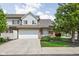 Charming townhome with an attached garage, manicured lawn, and beautiful landscaping at 9404 Enclave Dr # D, Avon, IN 46123