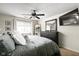 Main bedroom with a dresser, large bed, and carpet at 9404 Enclave Dr # D, Avon, IN 46123