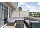 Outdoor patio with a modular couch and a black table at 9404 Enclave Dr # D, Avon, IN 46123
