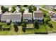 Aerial shot showcases a residential area with backyards, play areas, and serene landscaping at 10773 Brighton Knoll S Pkwy, Noblesville, IN 46060