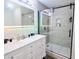 Modern bathroom featuring double sinks, a large mirror, and a glass-enclosed shower at 10773 Brighton Knoll S Pkwy, Noblesville, IN 46060