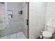 This bathroom has a glass-enclosed shower and toilet at 10773 Brighton Knoll S Pkwy, Noblesville, IN 46060