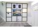Beautiful decorated hallway with custom wall paneling and stylish decor at 10773 Brighton Knoll S Pkwy, Noblesville, IN 46060
