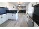 Modern kitchen with stainless steel appliances and dark countertops at 10773 Brighton Knoll S Pkwy, Noblesville, IN 46060