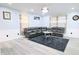 Spacious living room featuring a large sectional sofa and stylish decor at 10773 Brighton Knoll S Pkwy, Noblesville, IN 46060
