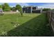 Expansive backyard featuring lush green grass, a wooden fence, and plenty of space at 1214 Lindsey Ln, Lebanon, IN 46052