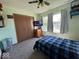 Bright bedroom featuring a comfortable bed, large window, and ample closet space at 1214 Lindsey Ln, Lebanon, IN 46052