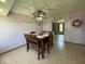Dining room boasts neutral walls, modern light fixture, and seating for six at 1214 Lindsey Ln, Lebanon, IN 46052