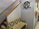 Cozy entryway with a bench, stairs, door and wall decor featuring the Gathering name at 1214 Lindsey Ln, Lebanon, IN 46052