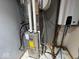 Image of a modern furnace and water heater set up in a utility area at 1214 Lindsey Ln, Lebanon, IN 46052