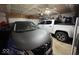Organized garage with ample space for two vehicles and storage, ideal for car enthusiasts at 1214 Lindsey Ln, Lebanon, IN 46052