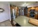 Kitchen showcases stainless steel appliances, wood cabinets, tile flooring, and lavender walls at 1214 Lindsey Ln, Lebanon, IN 46052