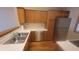 Well-lit kitchen with stainless steel appliances and wooden cabinets at 123 Old Farm Rd, Danville, IN 46122