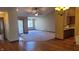 Open-concept living space with vaulted ceilings, hardwood floors, and modern lighting fixtures at 123 Old Farm Rd, Danville, IN 46122