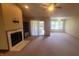 Spacious living room with a fireplace, carpet, and ample natural light at 123 Old Farm Rd, Danville, IN 46122