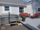 Backyard deck with a new hot tub and outdoor seating area at 12681 E 79Th St, Indianapolis, IN 46236