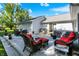 Inviting backyard with hot tub, lounge furniture, and dining area on the deck, perfect for entertaining at 12681 E 79Th St, Indianapolis, IN 46236