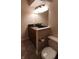 Bathroom featuring vanity, mirror, lighting, and white toilet at 12681 E 79Th St, Indianapolis, IN 46236