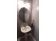 Pedestal sink bathroom with a neutral color palette and bright lighting at 12681 E 79Th St, Indianapolis, IN 46236