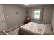 Comfortable bedroom with natural light and cozy quilt at 12681 E 79Th St, Indianapolis, IN 46236