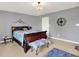 Elegant bedroom featuring neutral carpet, a window, and a crystal chandelier at 12681 E 79Th St, Indianapolis, IN 46236