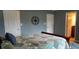 Spacious bedroom with wood sleigh bed, soft colors, and cool wall decor at 12681 E 79Th St, Indianapolis, IN 46236