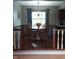 Charming dining area with wood floors, a chandelier, and backyard views at 12681 E 79Th St, Indianapolis, IN 46236