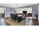 Open floor plan shows dining room with seating for eight flowing into the living room at 12681 E 79Th St, Indianapolis, IN 46236